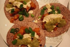 Chipotle potato tacos with roasted tomatillo salsa and vegan crema