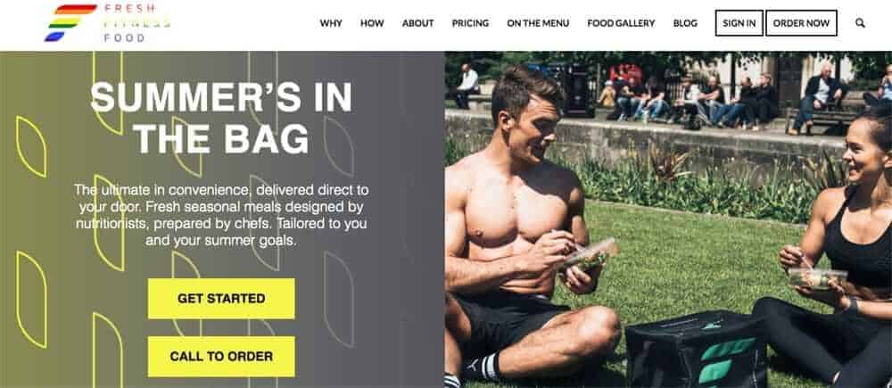 Screenshot of healthy food delivery uk - fresh fitness food's page showing two people eating in a park