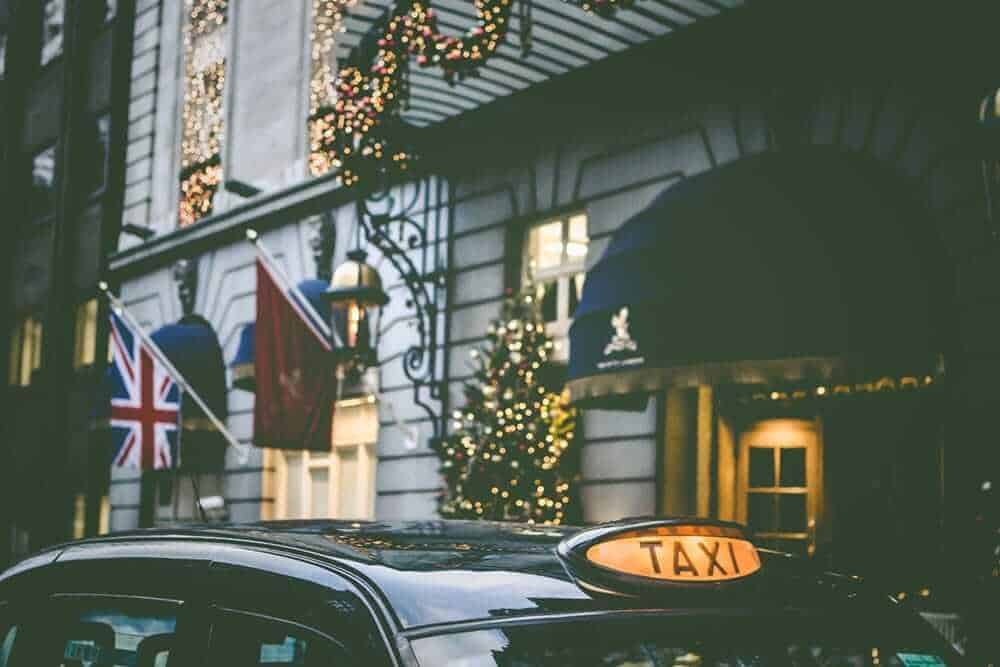 Black cab in front of London hotel