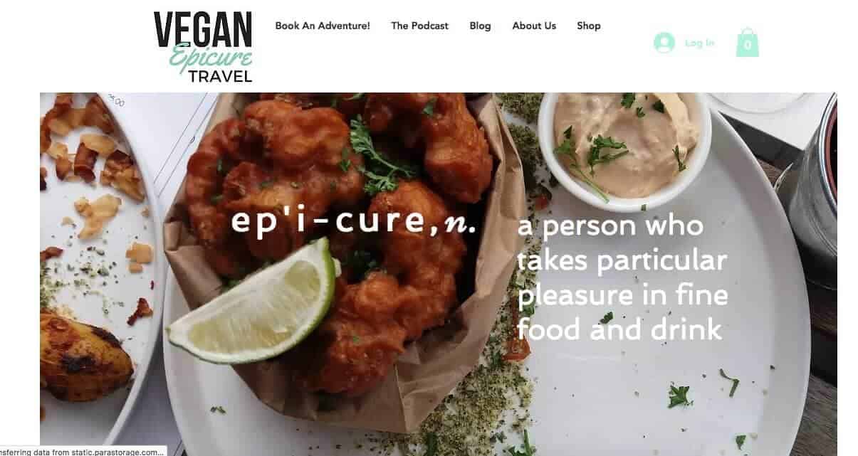 Screenshot of Vegan Epicure Travel page showing a plate of food, garnished with a lime