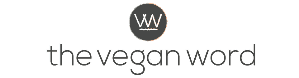 The vegan word logo: circular containing decorative "vw" and text below which reads "the vegan word"