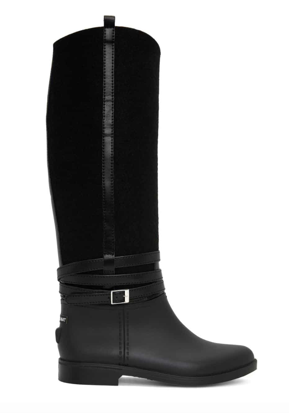 Flat tall black boots with strap wrapped multiple times around the ankle and decorative ankle buckle