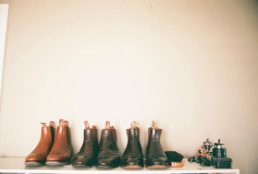 Brown and black Chelsea boots lined up in a row