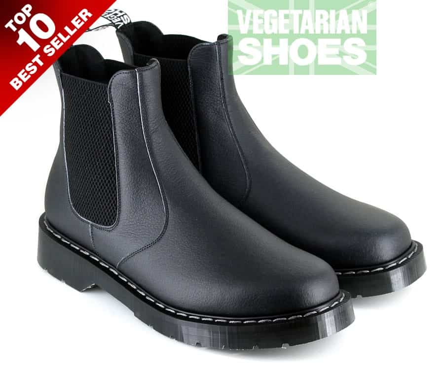 Black Chelsea boots with pull that says Vegetarian Shoes
