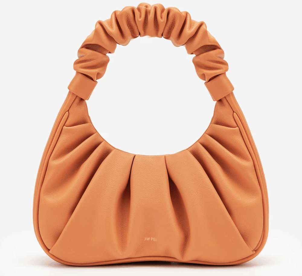 Peach ruched vegan leather bag