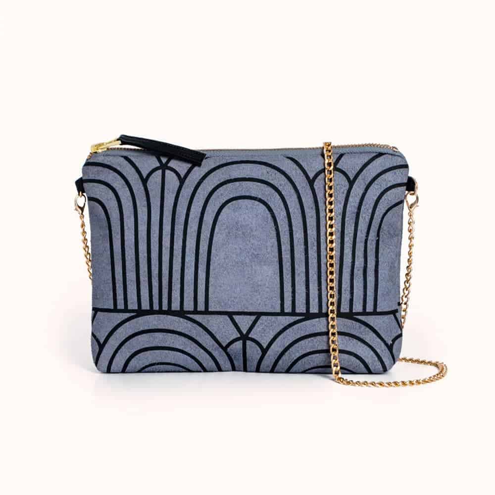 Blue crossbody with art deco pattern and gold chain from Lee Coren