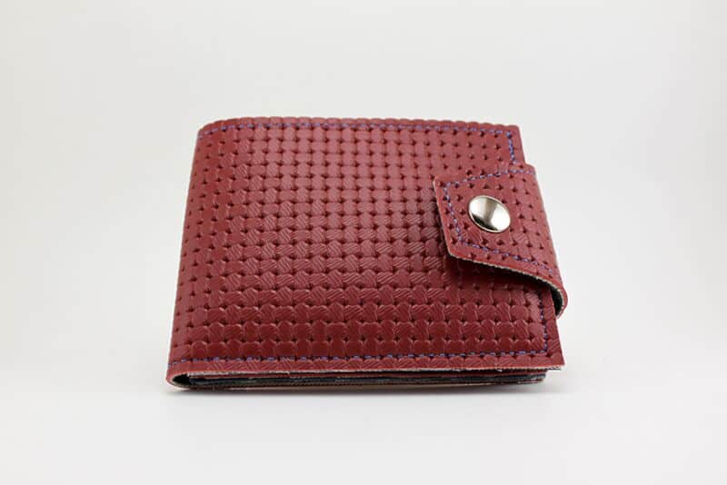 Dark red wallet with snap closure in textured finish