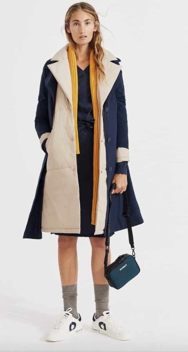 Person shown wearing navy blue and beige Ecoalf coat