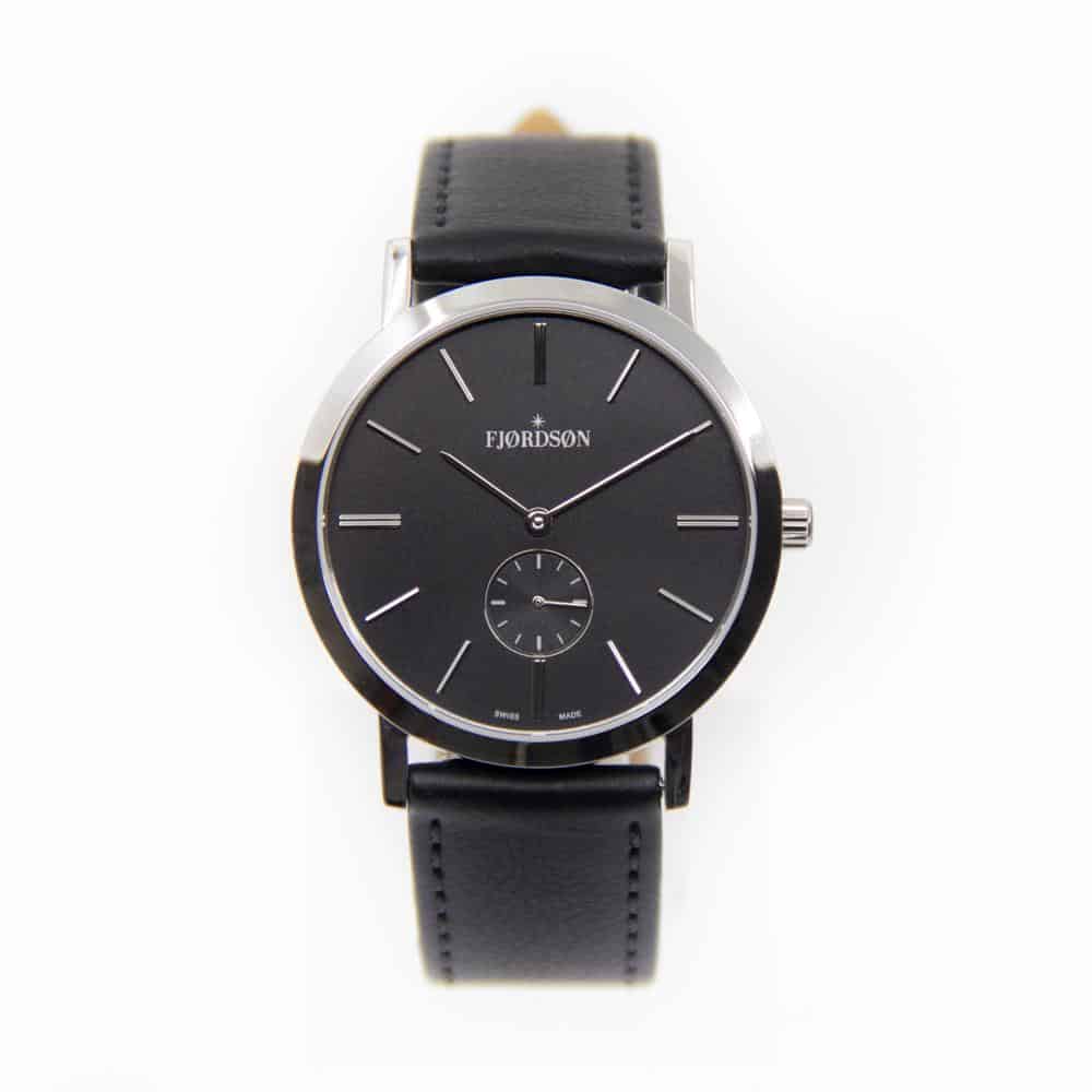 Watch with black strap, black dial, silver hardware