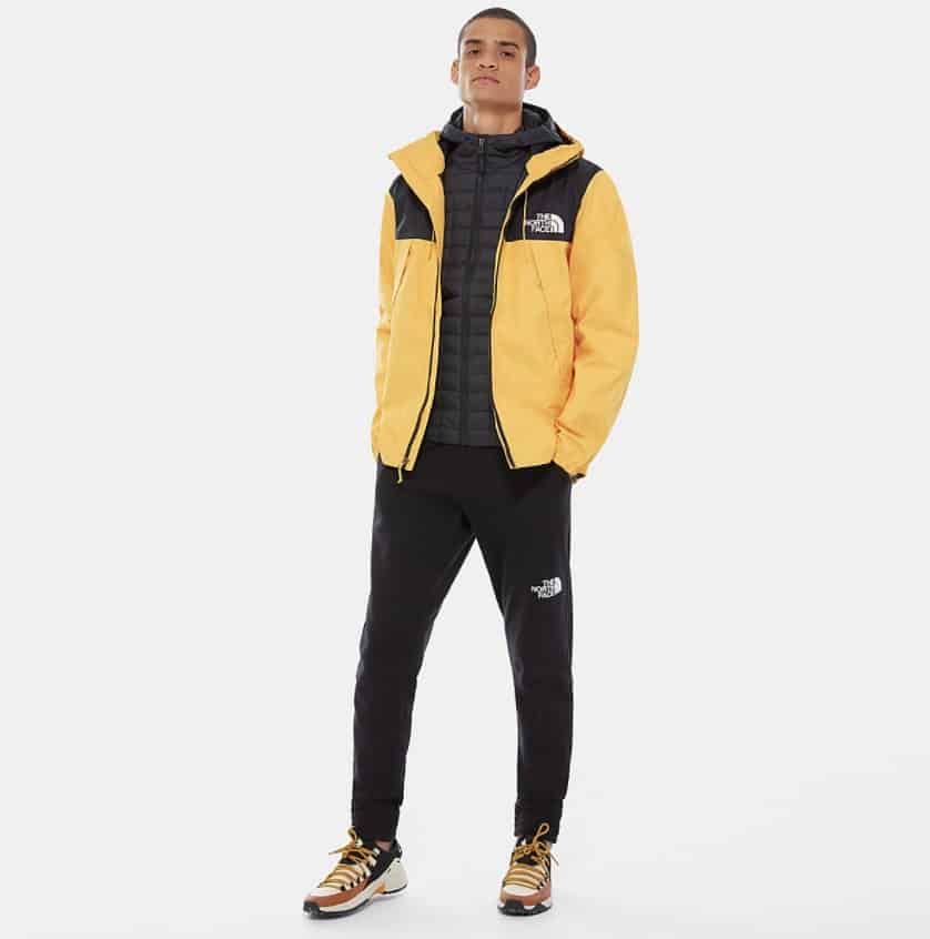 Person shown wearing yellow The North Face jacket