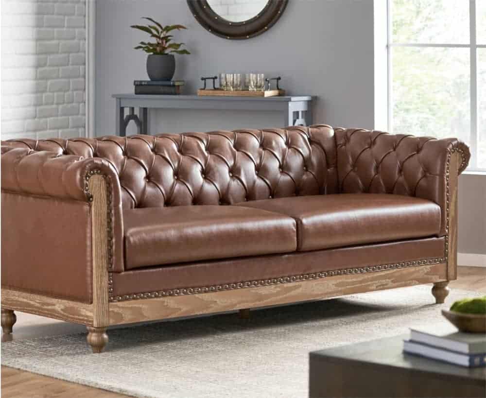 Brown vegan leather Chesterfield style sofa