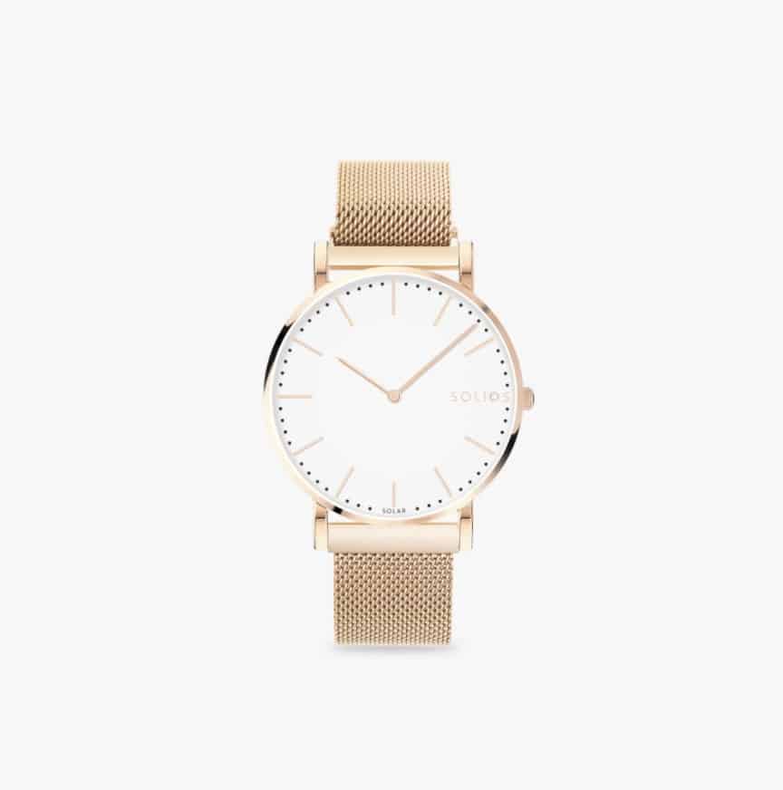 Solar powered watch with white dial, gold hardware, gold mesh strap