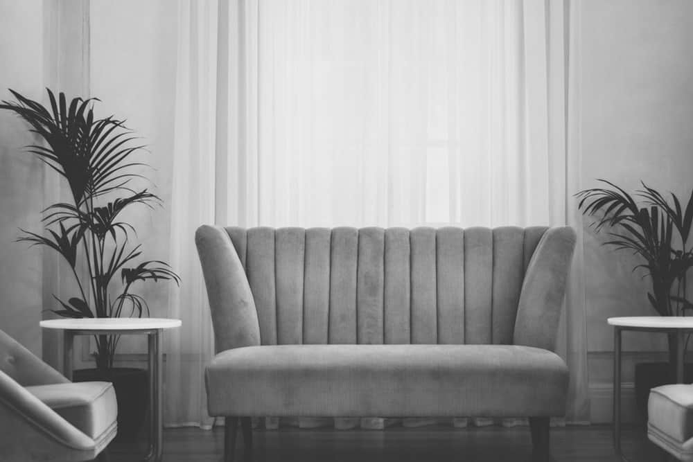 Black and white image of a loveseat