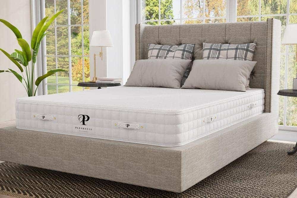 Mattress on grey bedframe