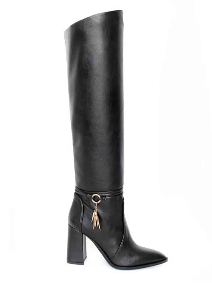 Heeled over the knee boots with a mini fake rose gold dagger hanging round the ankle