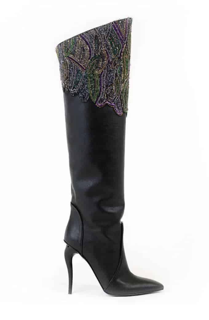 Stiletto heel black knee high boots with the top few inches covered in beading