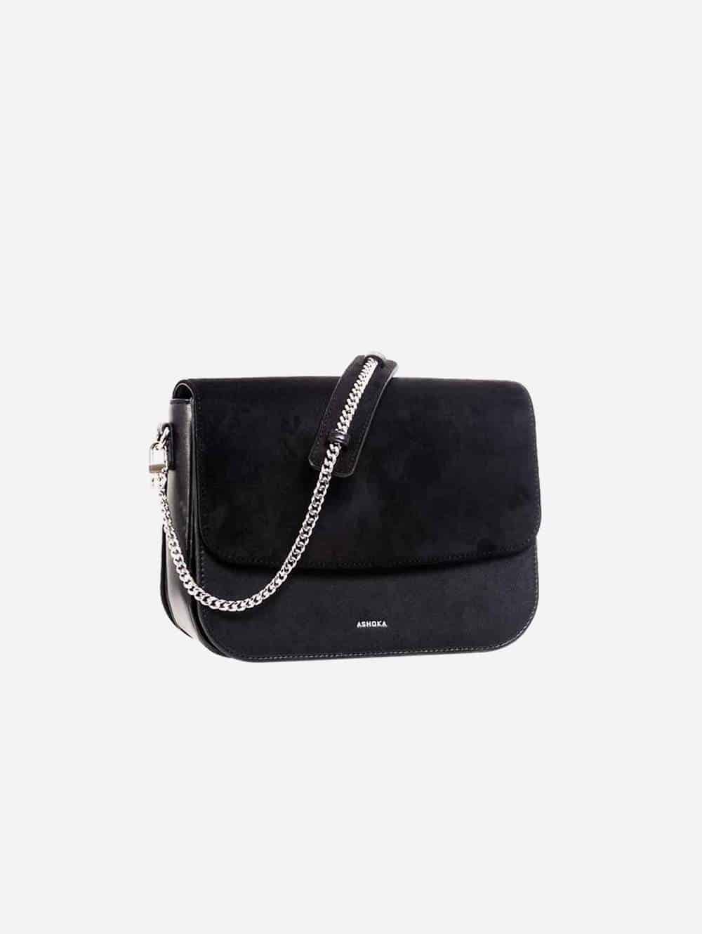 Black bag with silver and black chain link strap from Ashoka Paris