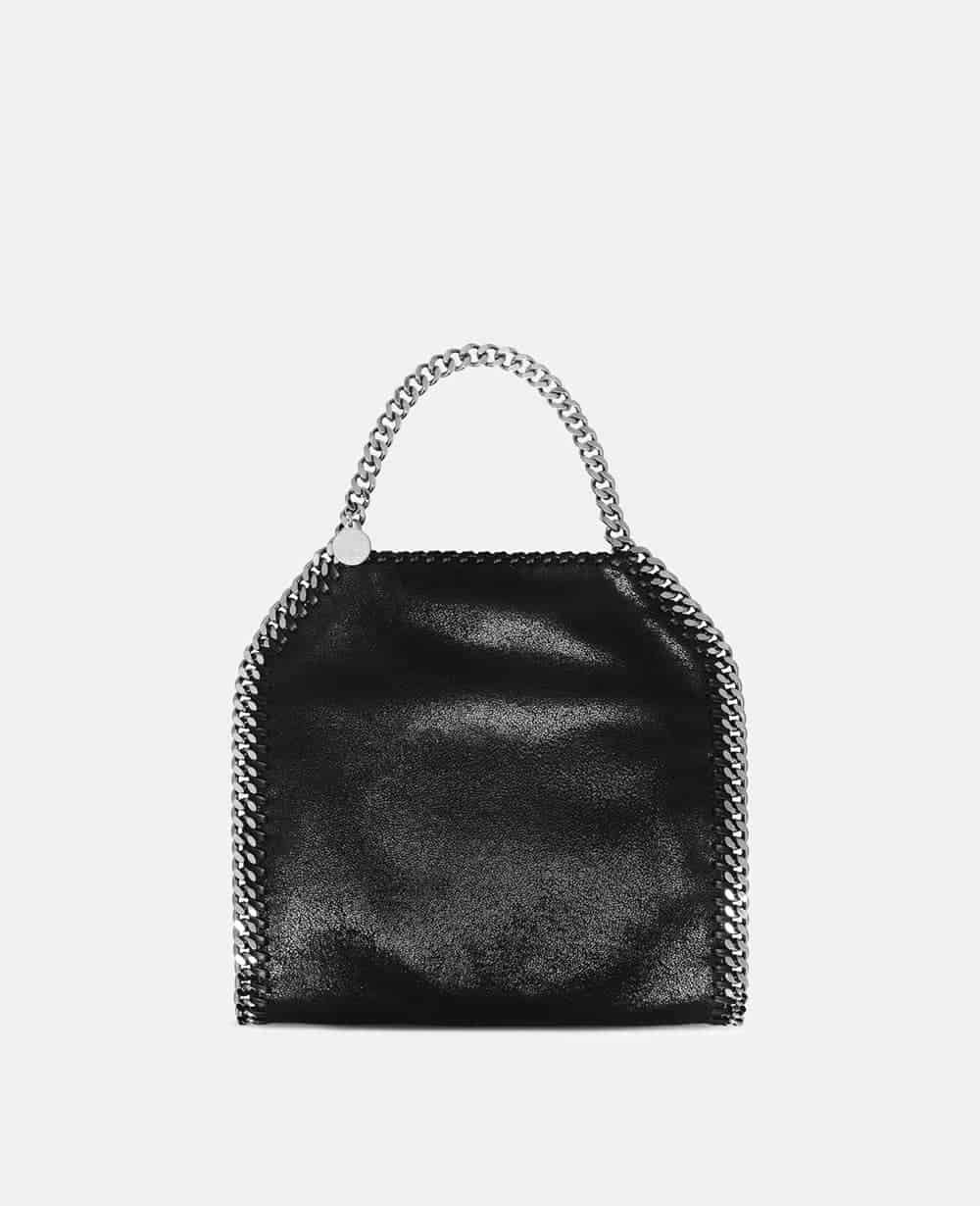 Black vegan leather bag with signature chain mail strap from Stella McCartney: Falabella mini tote