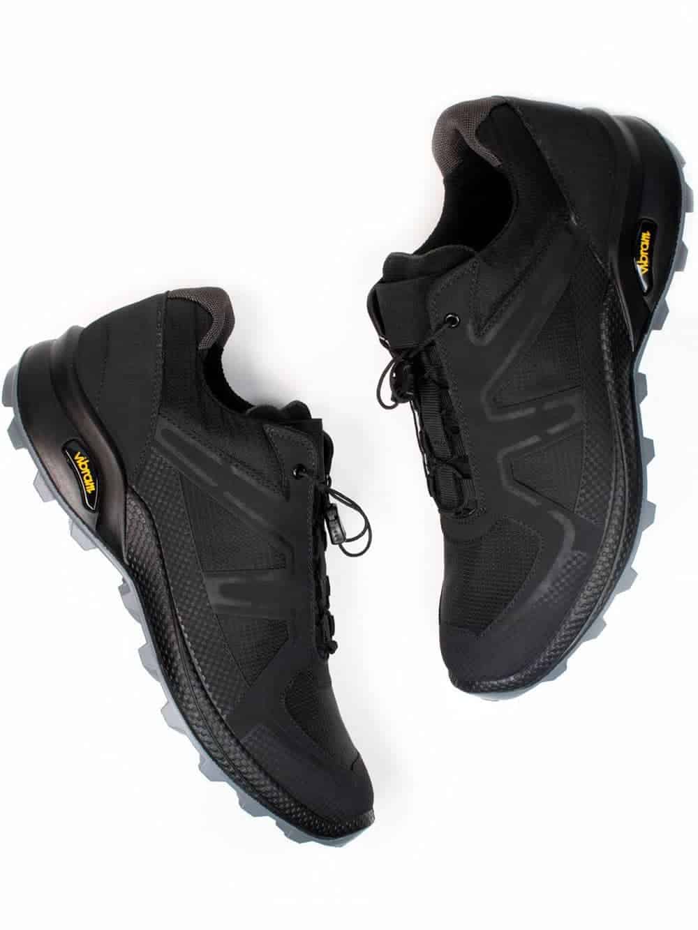 Black vegan running shoes with black laces and soles