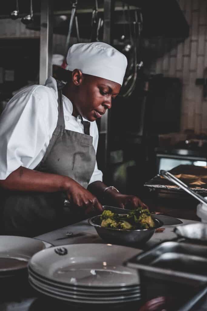 Chef preparing greens