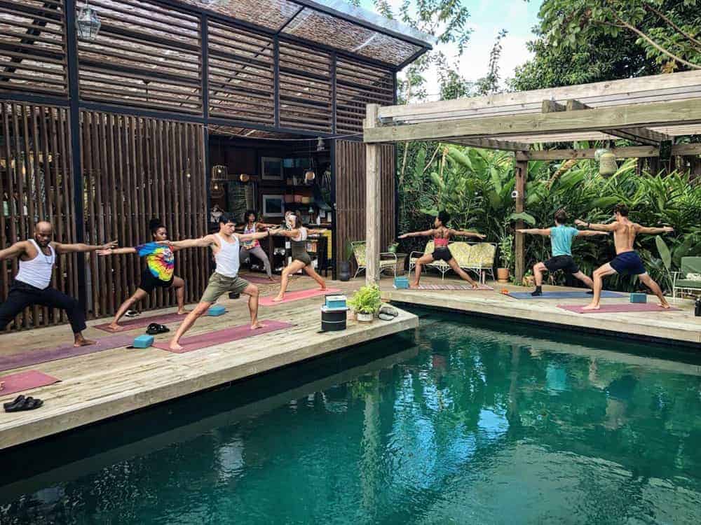 Yoga by the outdoor pool at Finca Victoria