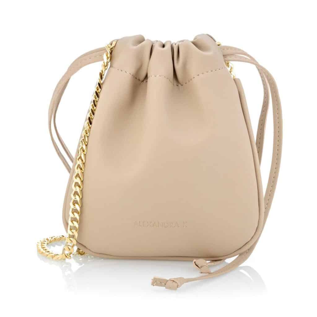 Cream vegan leather bucket bag with gold chain from Alexandra K