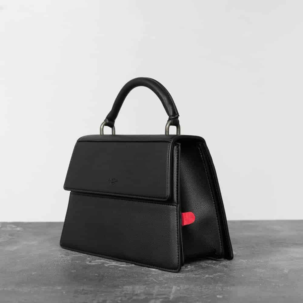 Black vegan leather triangular shaped satchel from Angela Roi