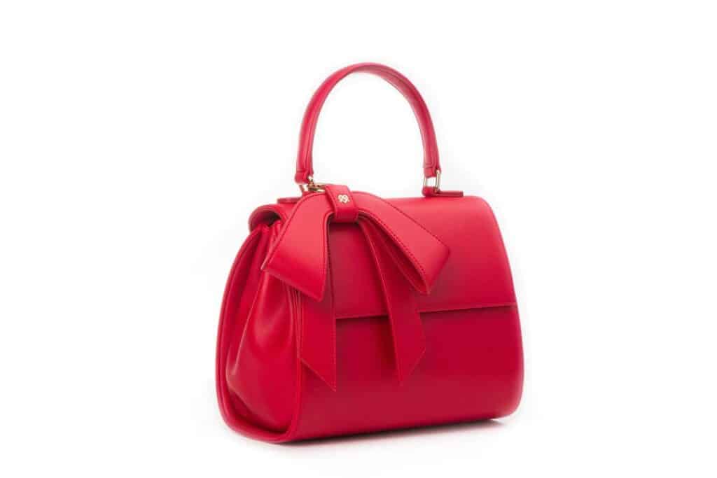 Red vegan leather GUNAS shoulder bag with red vegan leather bow
