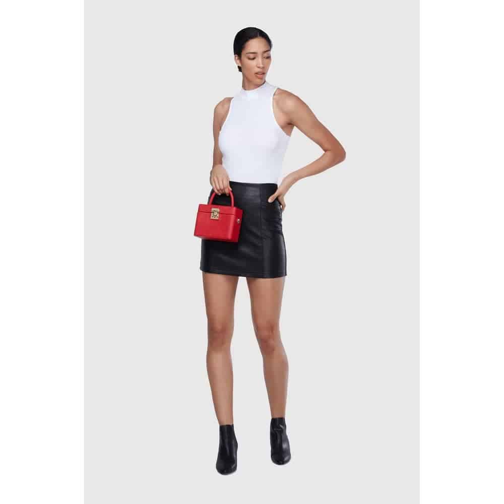 Person holding red vegan leather satchel from Labante