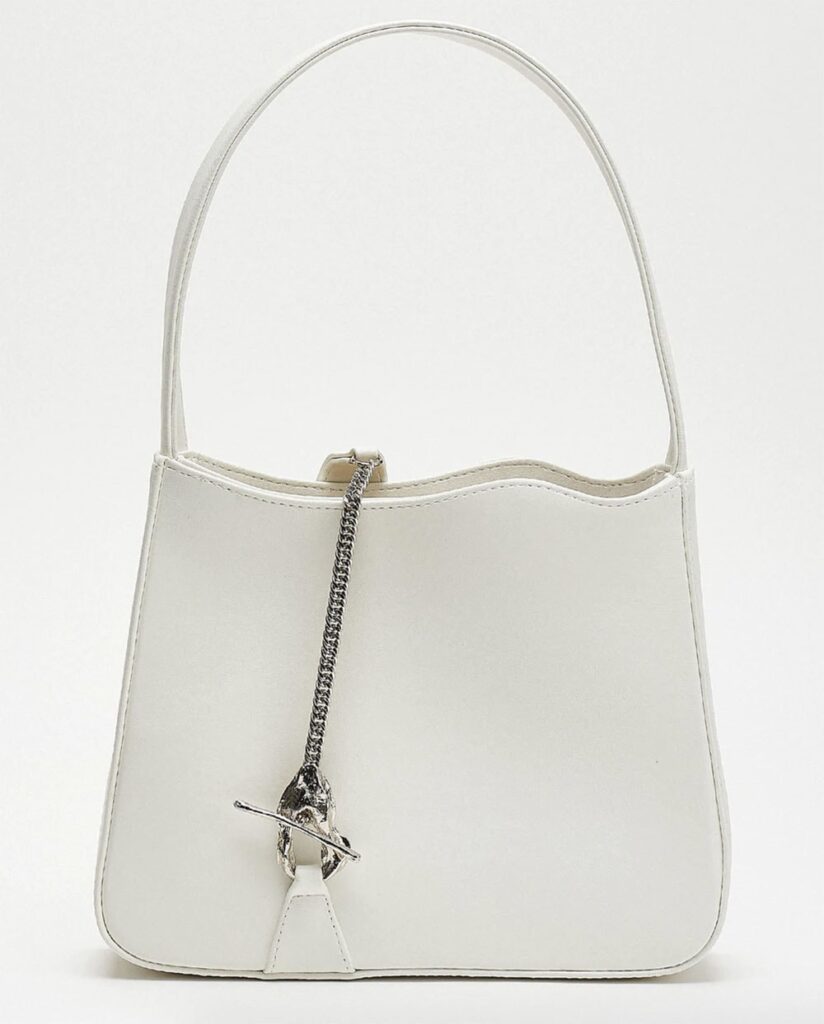 White vegan leather shoulder bag with silver chain