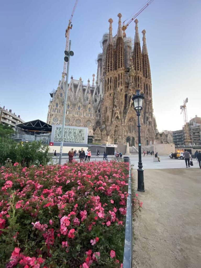 Sagrada Familia in springtime with flowers in bloom in front