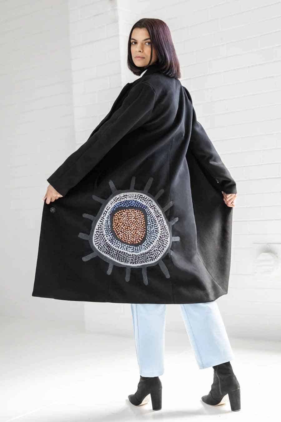 Unreal Fur lack vegan wool coat with embroided stitching on back