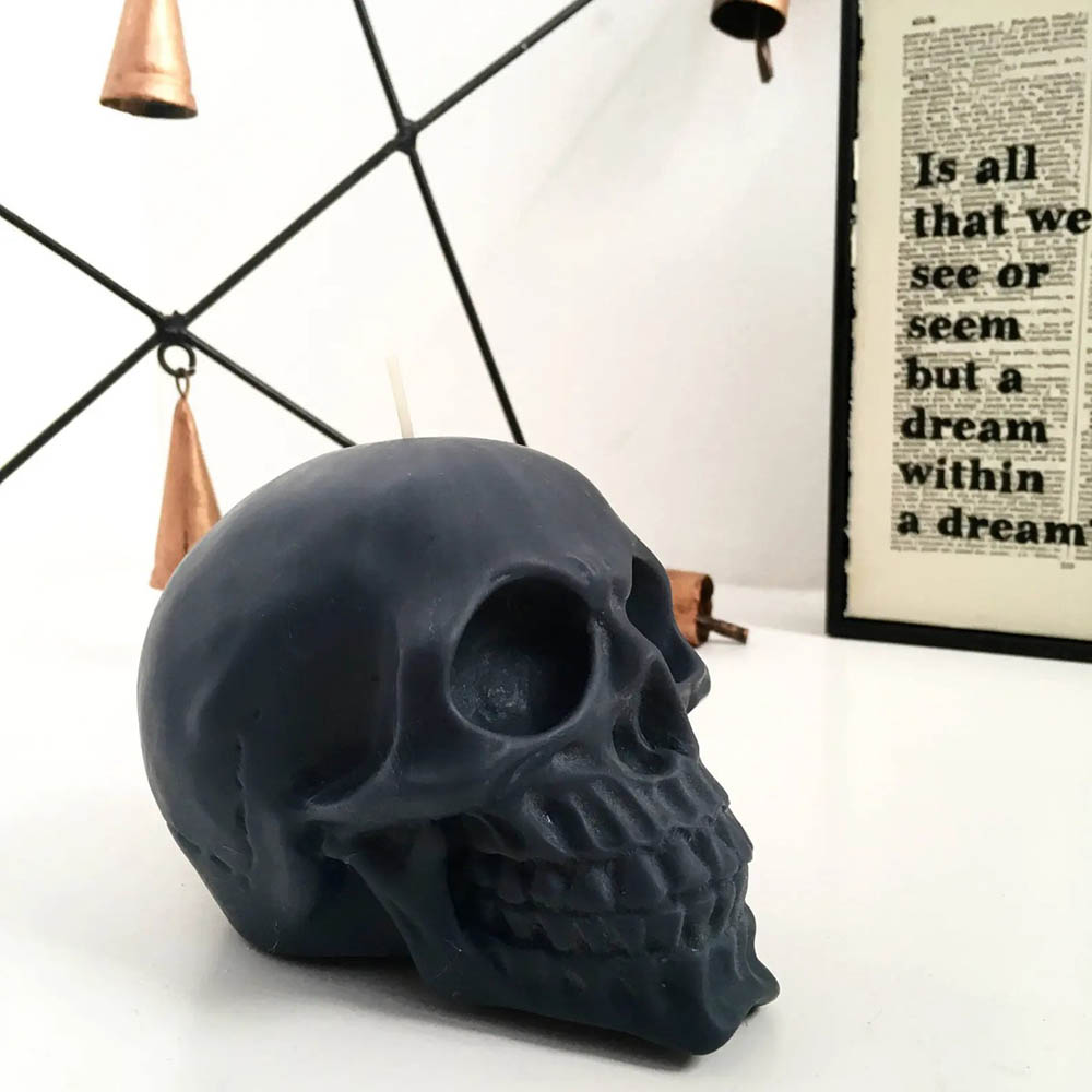 Skull candle sitting on shelf