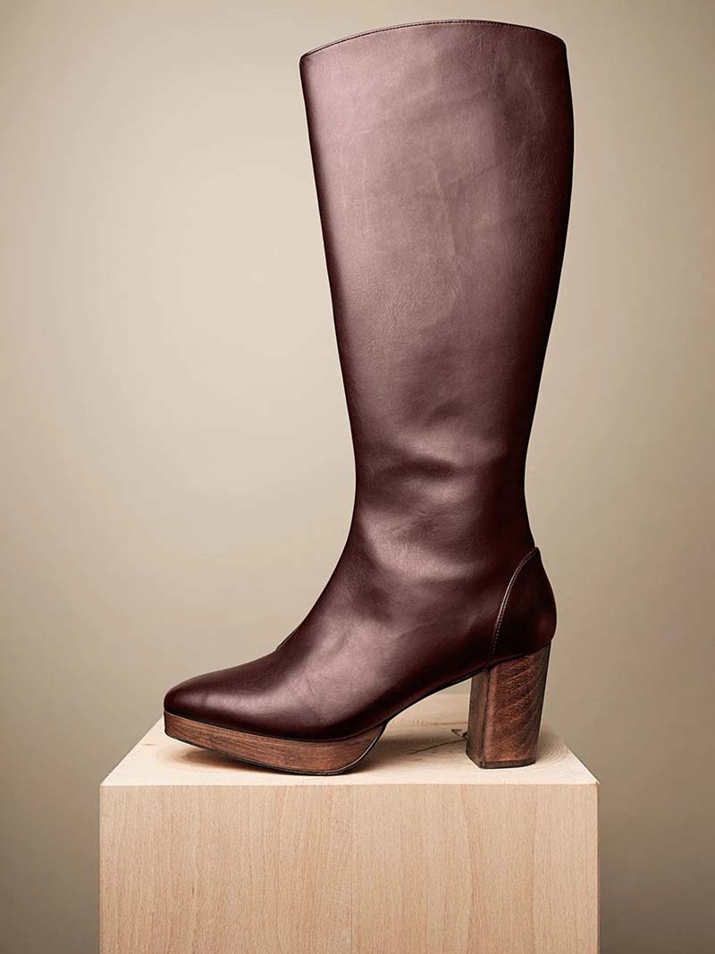 Burgundy vegan leather boots with tall upper, wooden heel and small wooden platform under toes