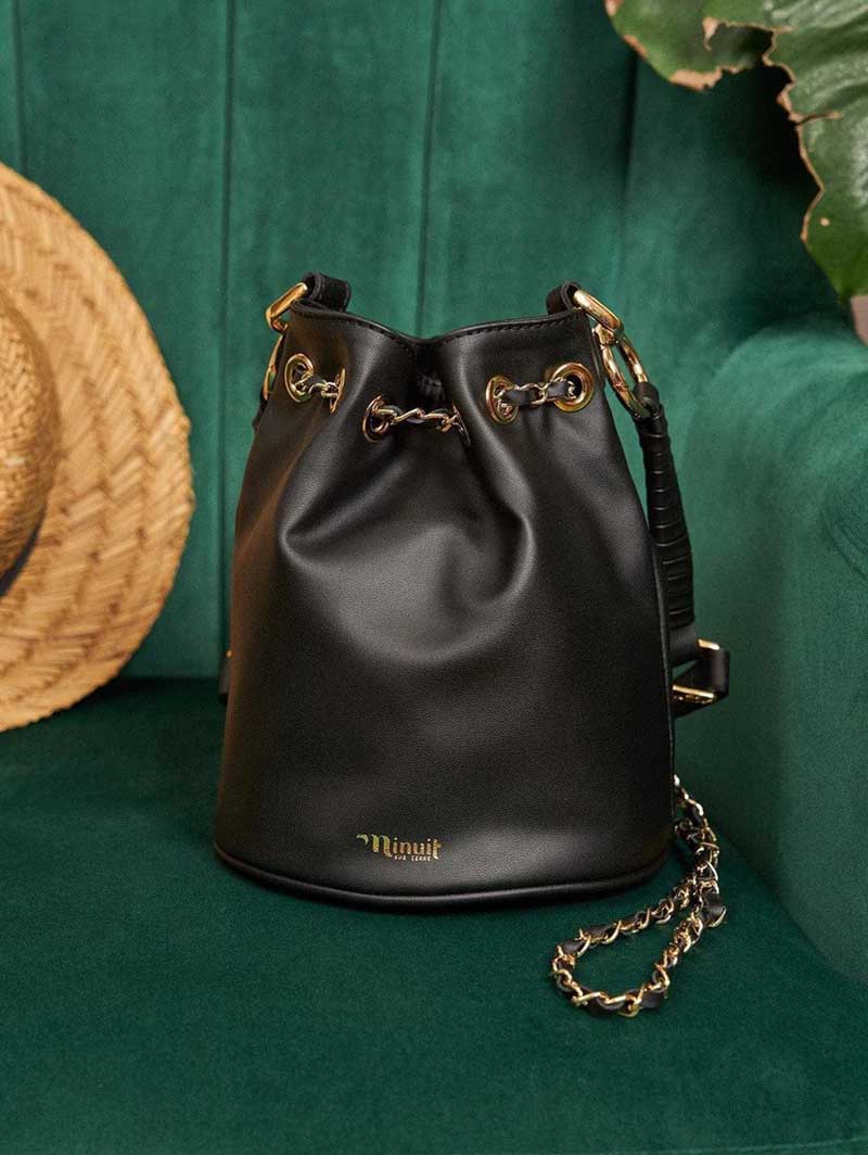 Black vegan grape leather bucket bag with gold hardware and drawstring top