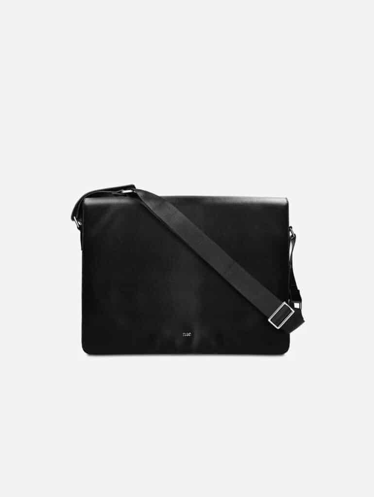 Black vegan apple leather briefcase with crossbody strap from NAE