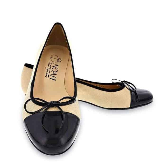 Black and cream vegan leather ballet flats with black bow