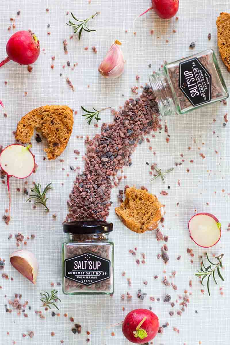 Kala namak/black salt, some displayed on counter and in glass jars