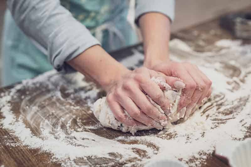 Person kneading dough