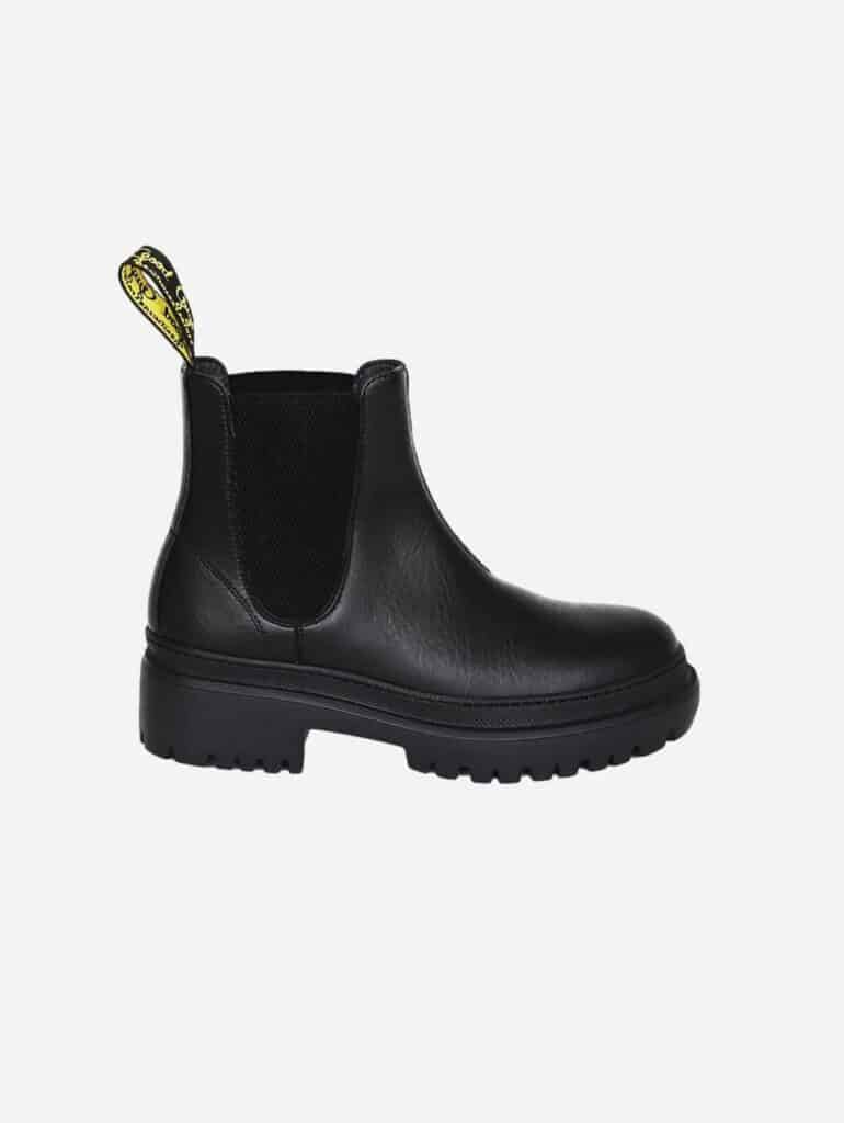 Vegan black leather chunky Chelsea boots with yellow pull grip to pull on