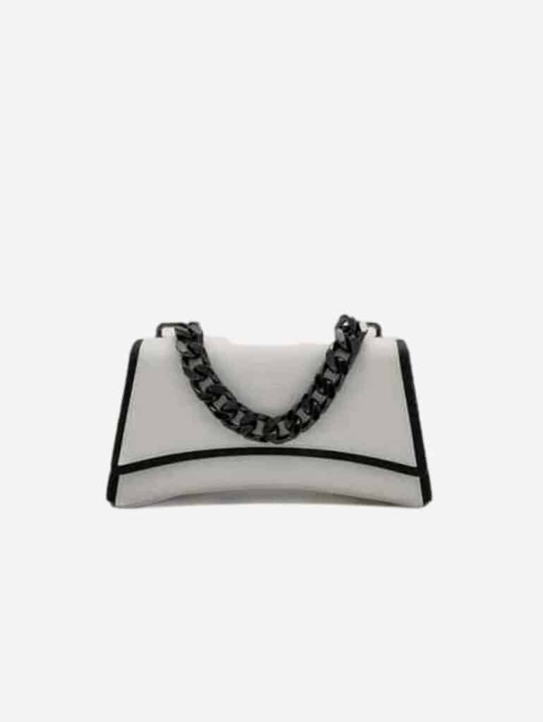 Eslla white vegan cactus leather crossbody bag with black trim and black chain link strap