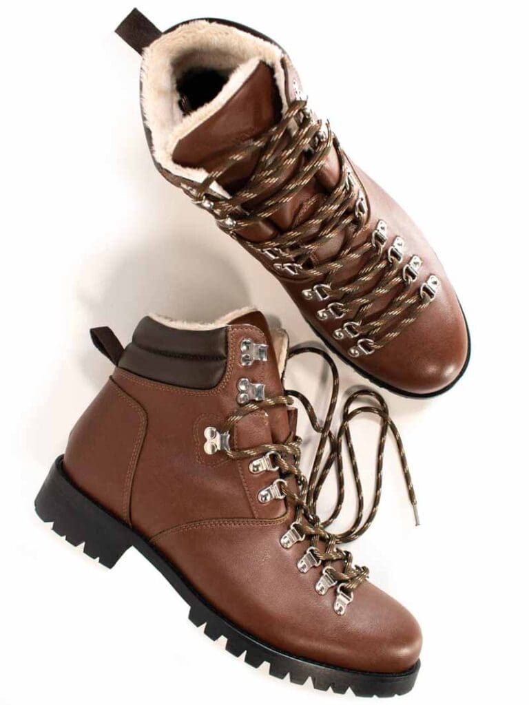 Brown vegan leather lace up vegan leather boots with white vegan shearling interior from Will's