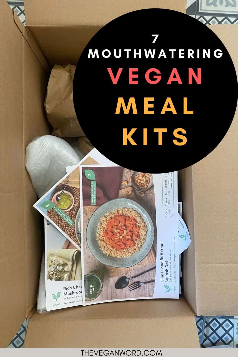 Pinterest image showing a meal kit box with recipe cards on top and text that reads "7 mouthwatering vegan meal kits"